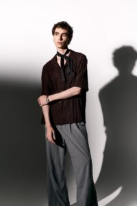stylish-young-man-showcases-modern-fashion-in-a-mi-2026-01-09-12-07-41-utc.jpg